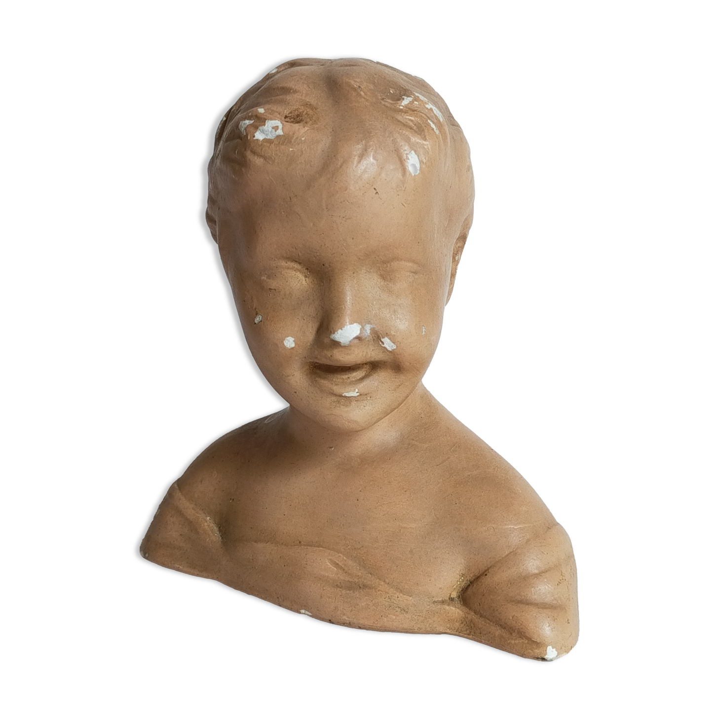 Bust of a small child in ancient plaster