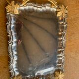 Silver metal top and decoration of foliage and handles in vintage brass