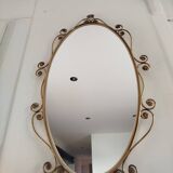 Oval mirror in gilded brass and floral horn, 1950s