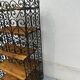 Antique display cabinet in wrought iron and wood