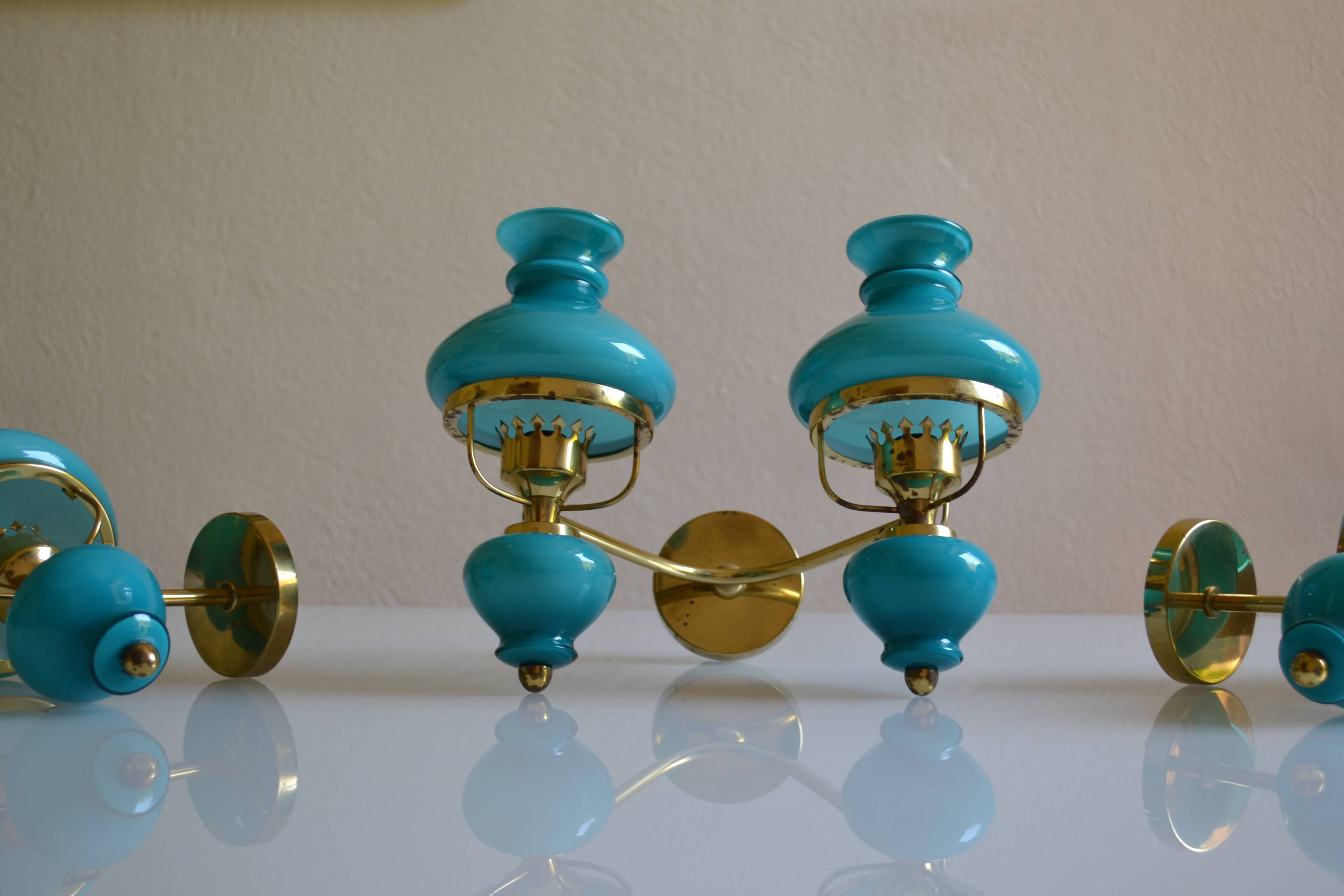 Series of 3 vintage brass and blue opaline wall lamps