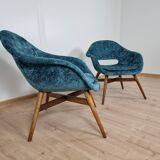 Restored shell armchairs by Miroslav Navratil