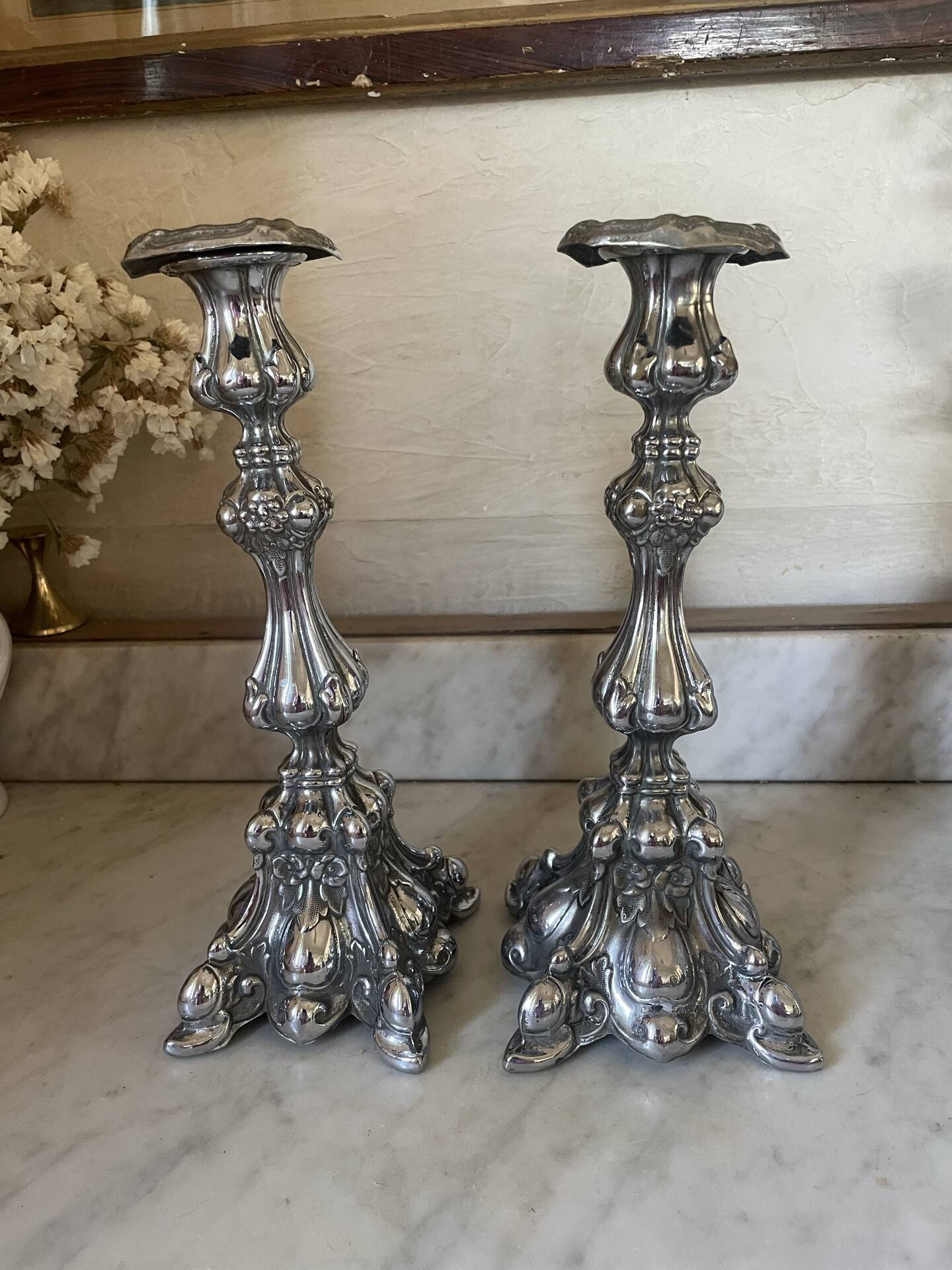 Pair of rococo silver-plated candlesticks