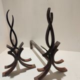Paire de chenets en fer  forgé par Raymond Subes vintage