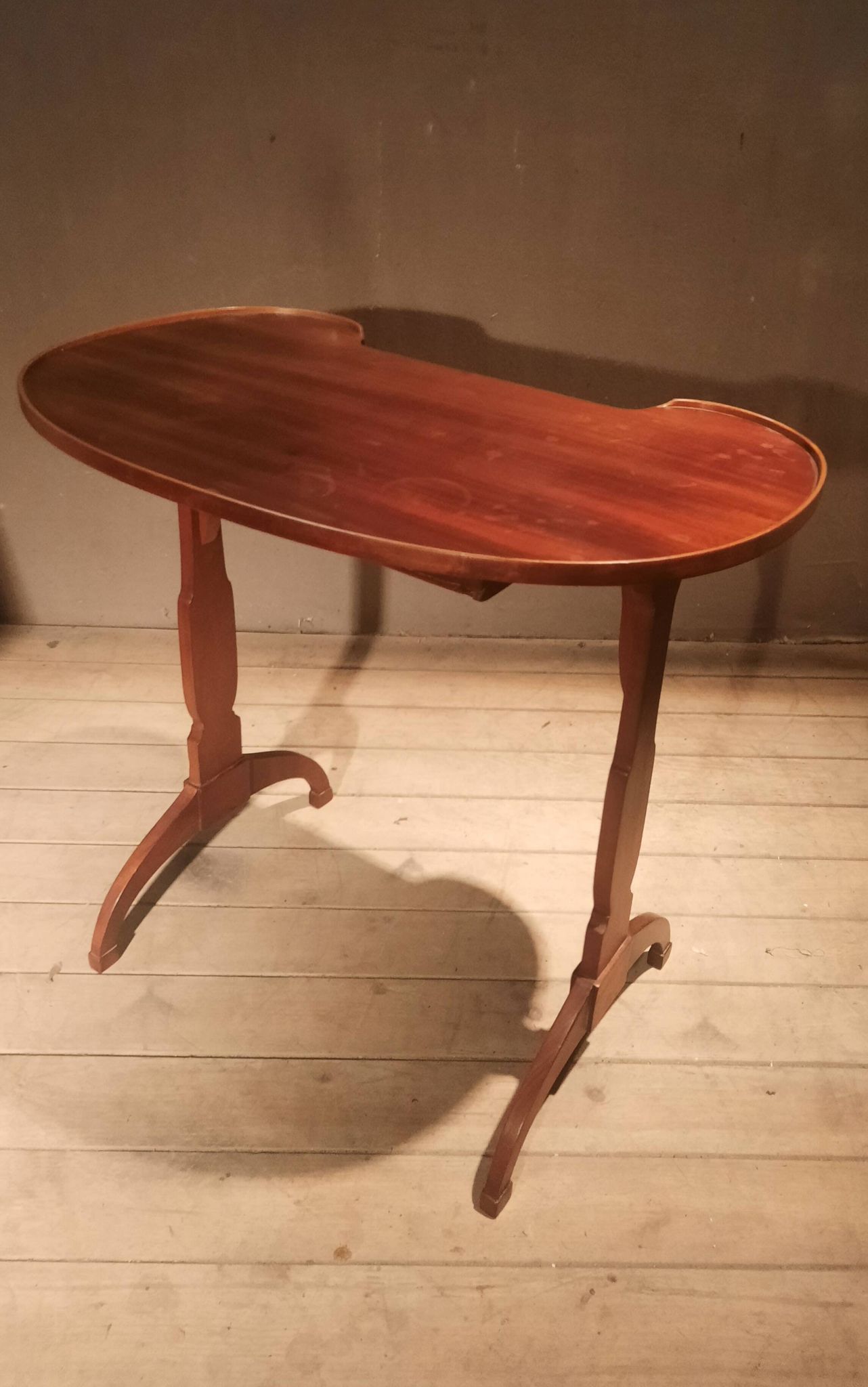 Kidney-shaped side table