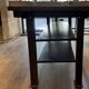 Industrial style creator table in bricks and metal on wheels.