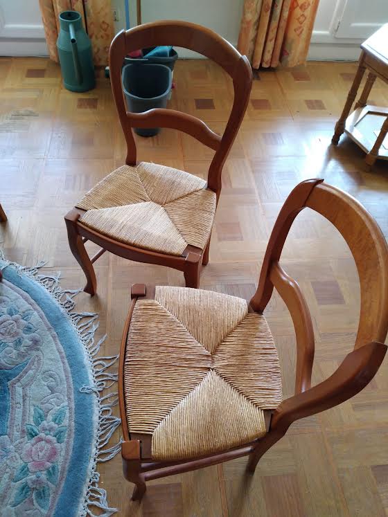 6 mulched solid wood chairs and 2 canework chairs