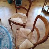 6 mulched solid wood chairs and 2 canework chairs