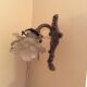 Old wall lamp in bronze and glass