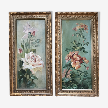 Two old paintings of flowers and gilded frames