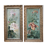 Two old paintings of flowers and gilded frames