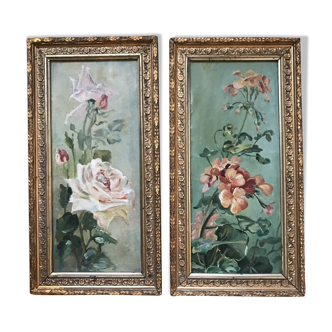 Two old paintings of flowers and gilded frames