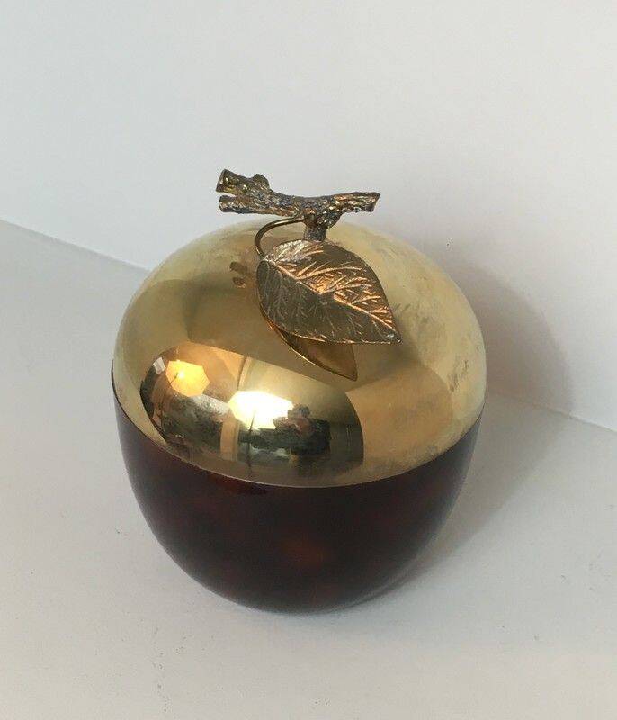 Apple-shaped ice bucket in red celluloid, gold-tone metal and plastic