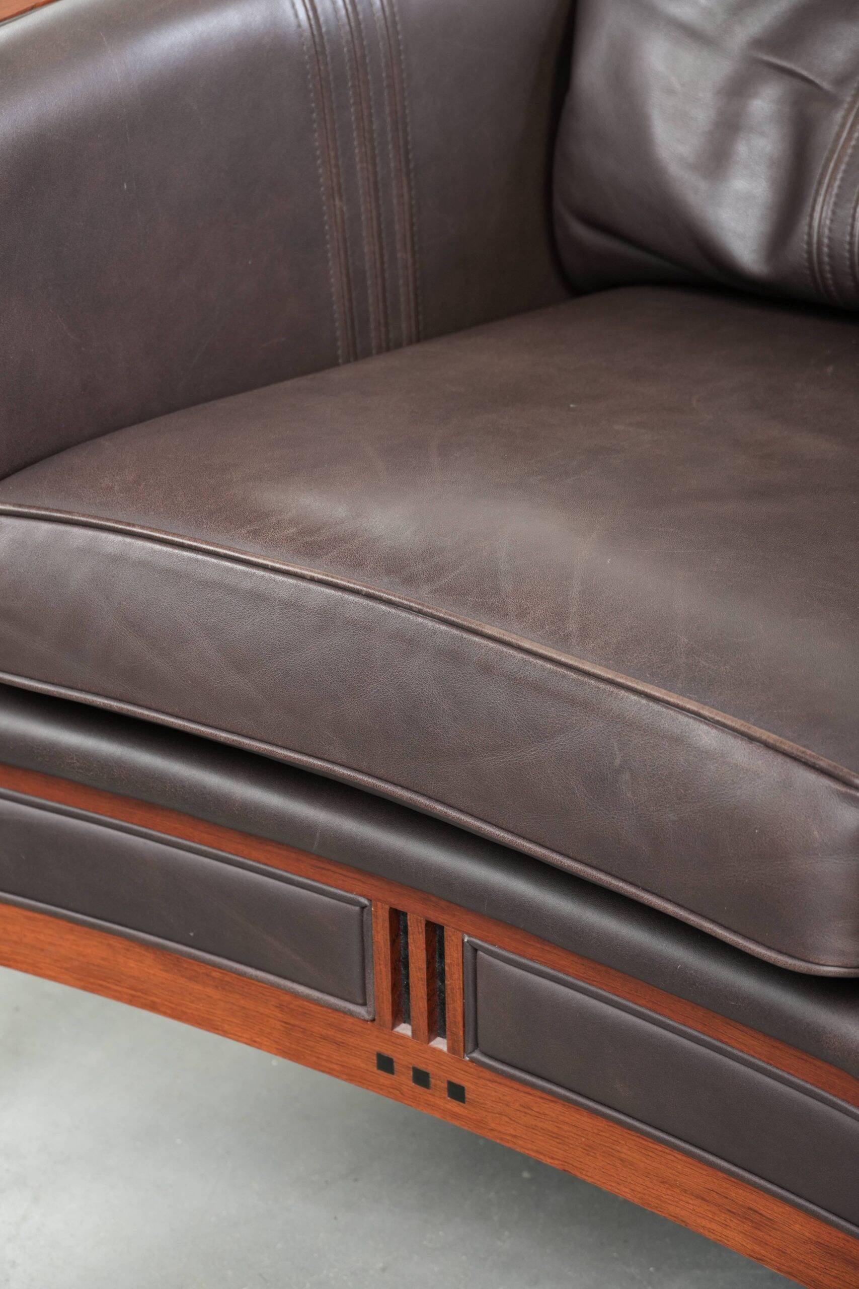 Art Deco design armchair with dark brown cowhide upholstery