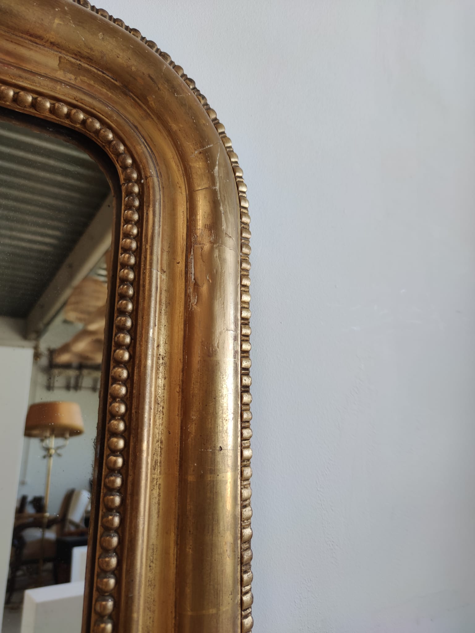 Louis Philippe gilded mirror with gendarme hat nineteenth H:130cm