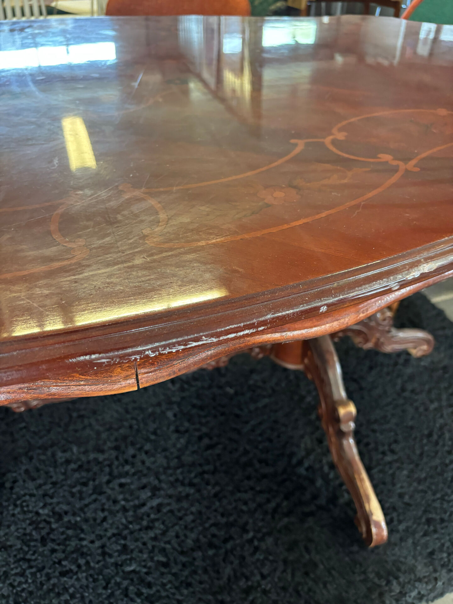 Oval table with marquetry top