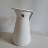 White enamelled metal jug