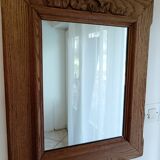 Antique mirror with knot in light oak