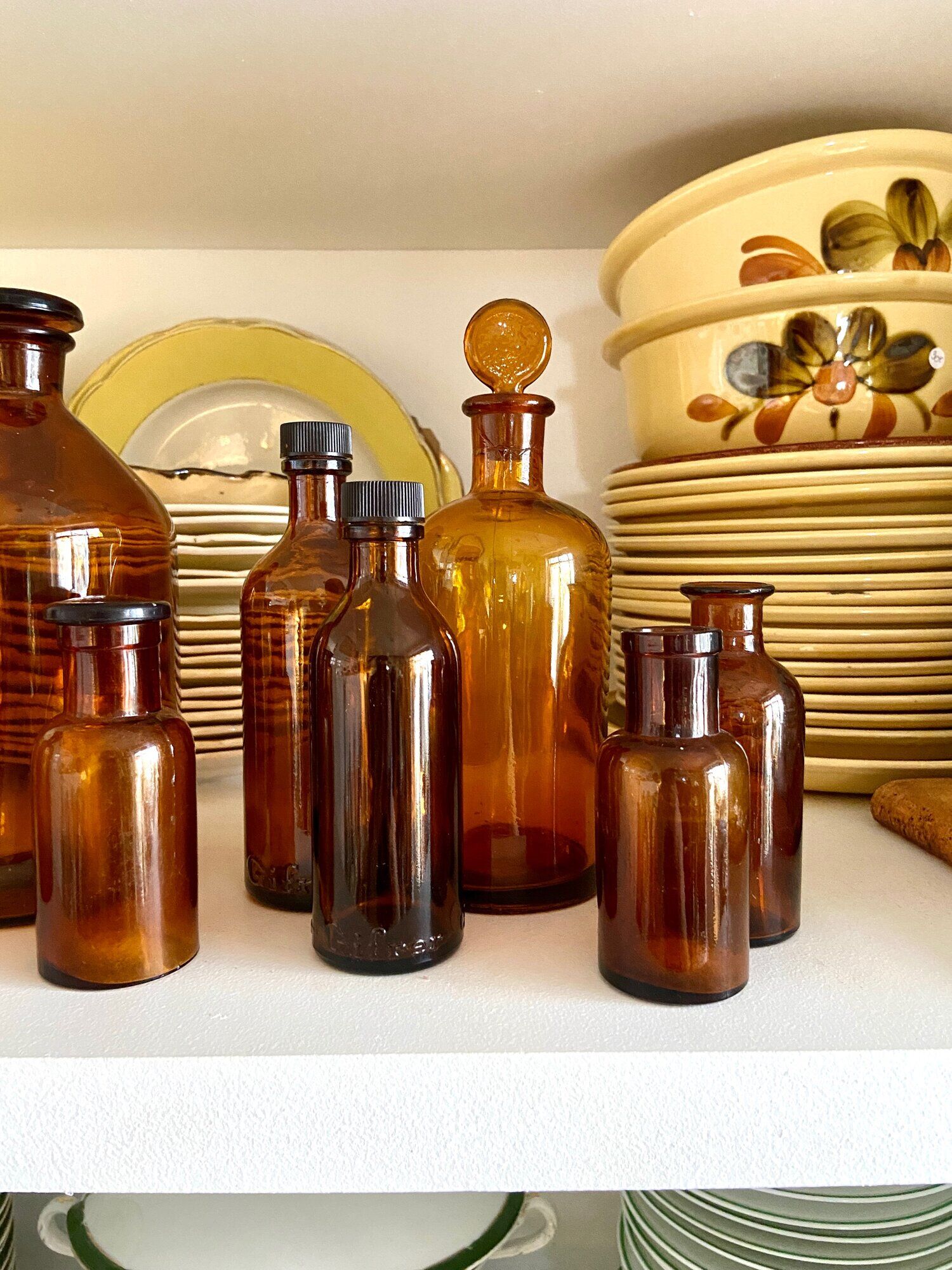 8 amber glass apothecary bottles