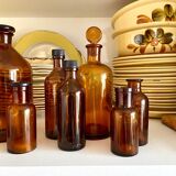 8 amber glass apothecary bottles