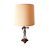 Large lamp mounted on old candlestick