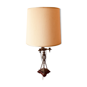 Large lamp mounted on old candlestick