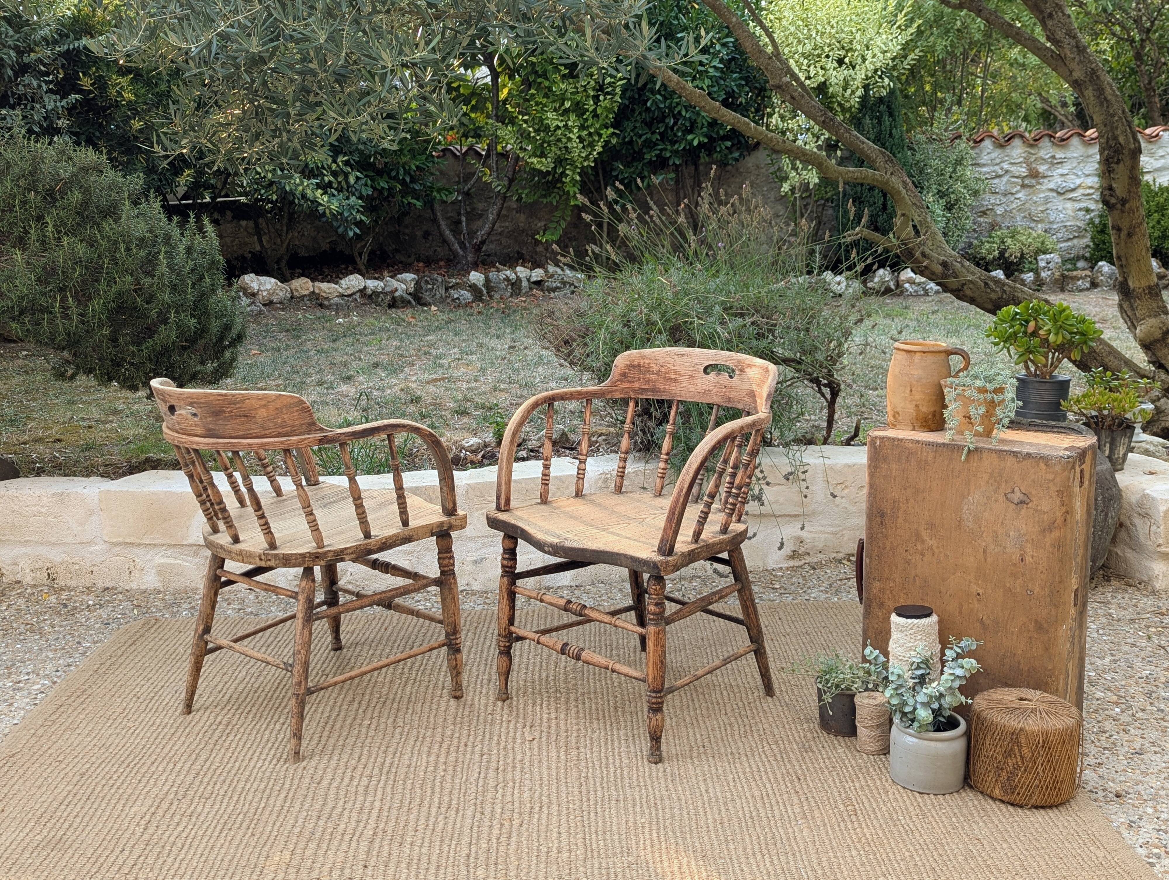 Pair of English captain's armchairs