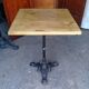 Bistro table feet in iron cast and solid wood tray