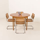 Teak round table with hidden extension, 1970s