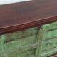 Buffet long en bois avec portes anciennes vertes