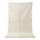 Ecru Moroccan rug with black dots.