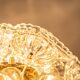 Sputnik ceiling light in floral glass and brass, Germany, 1960s.