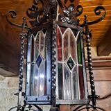 Wrought iron lantern with colored stained glass