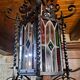 Wrought iron lantern with colored stained glass