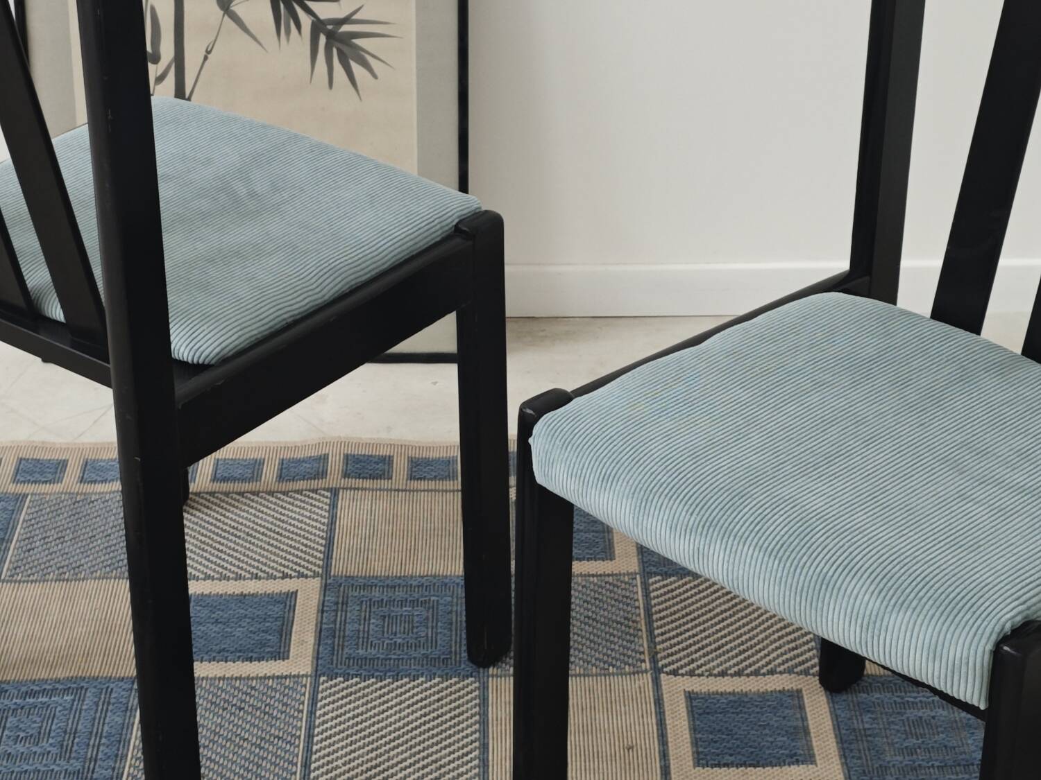 Set of 4 modernist black chairs with light blue ribbed fabric