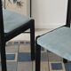Set of 4 modernist black chairs with light blue ribbed fabric