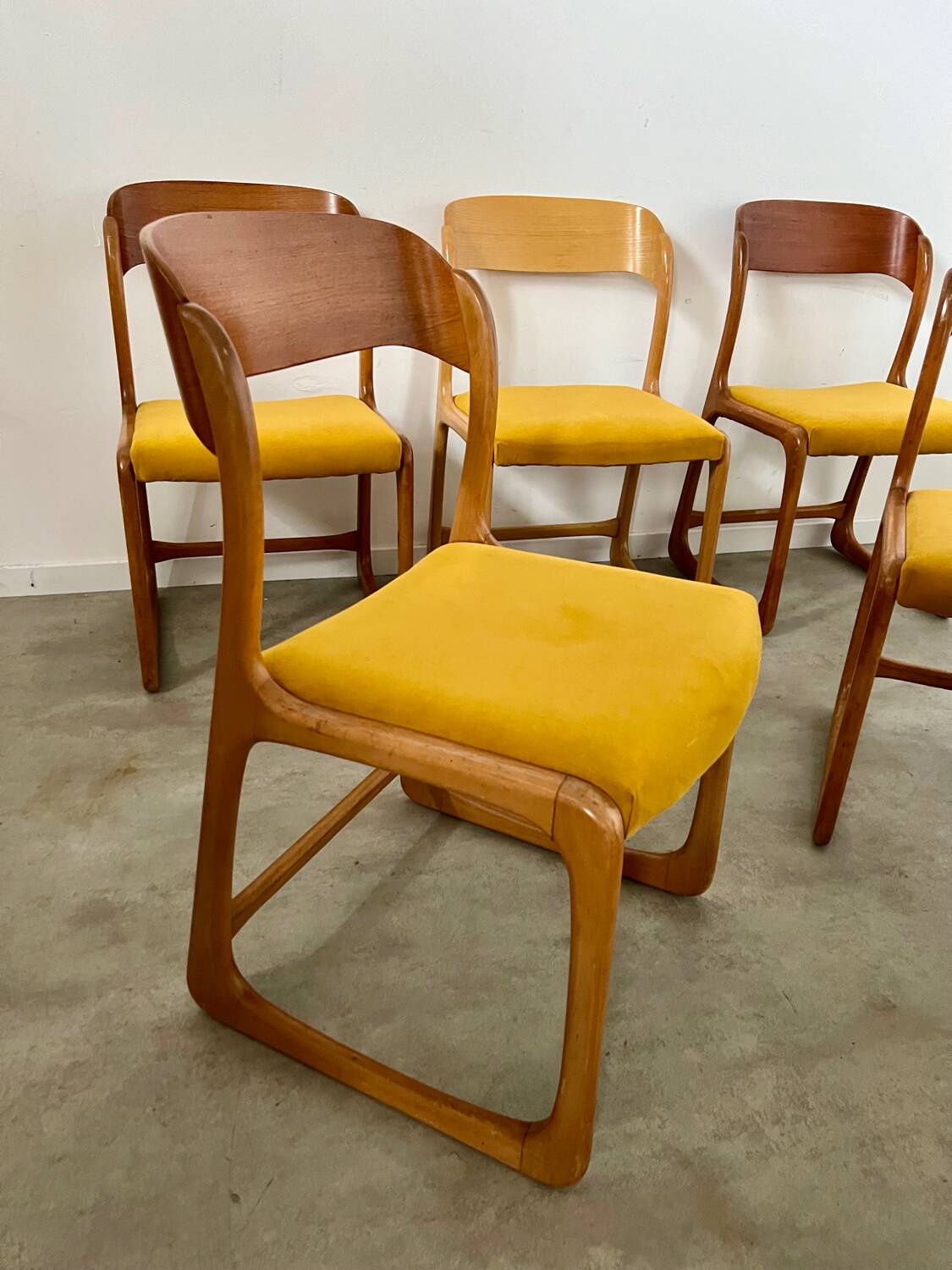 Set of 7 Baumann sled chairs in wood and mustard yellow fabric, 1960s