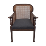 Colonial wooden armchair and cannage