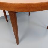Large vintage Scandinavian round table from the 50s 60s in teak with extensions