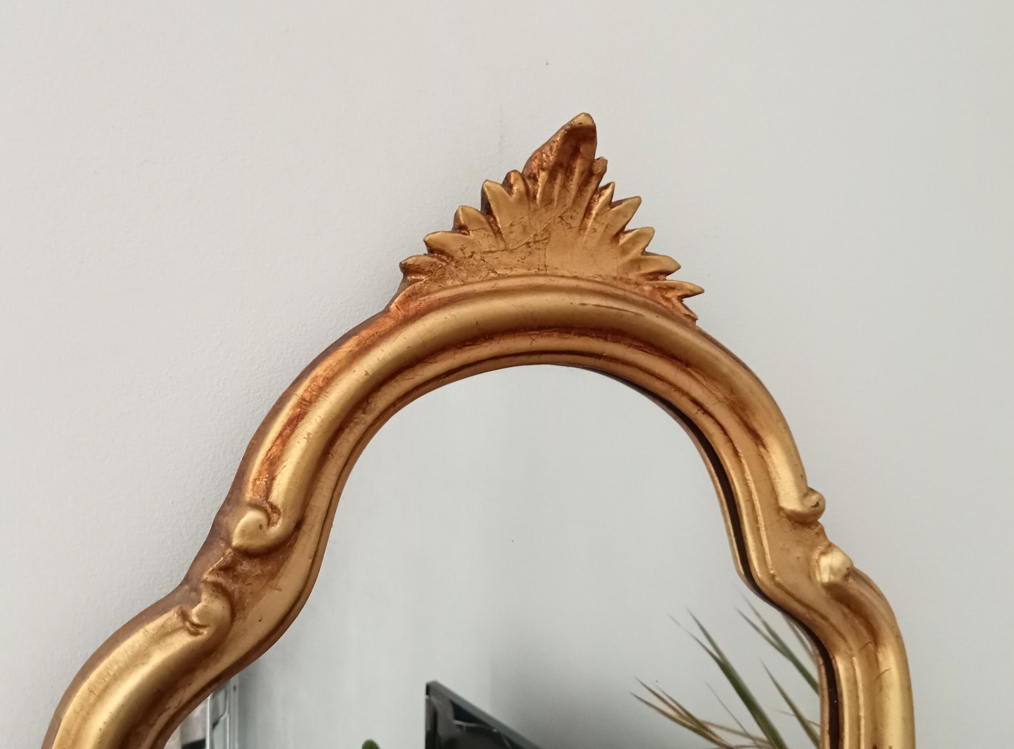 Vintage rocaille mirror in gilded wood