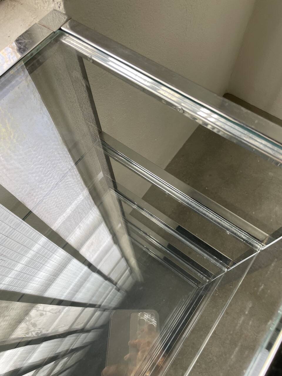 Pair of chrome and glass shelves from the 70s