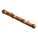 Varnished wooden wall coat rack with 4 hooks, antique item.