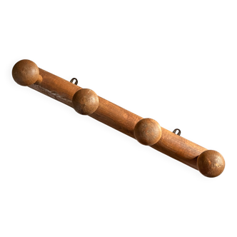 Varnished wooden wall coat rack with 4 hooks, antique item.