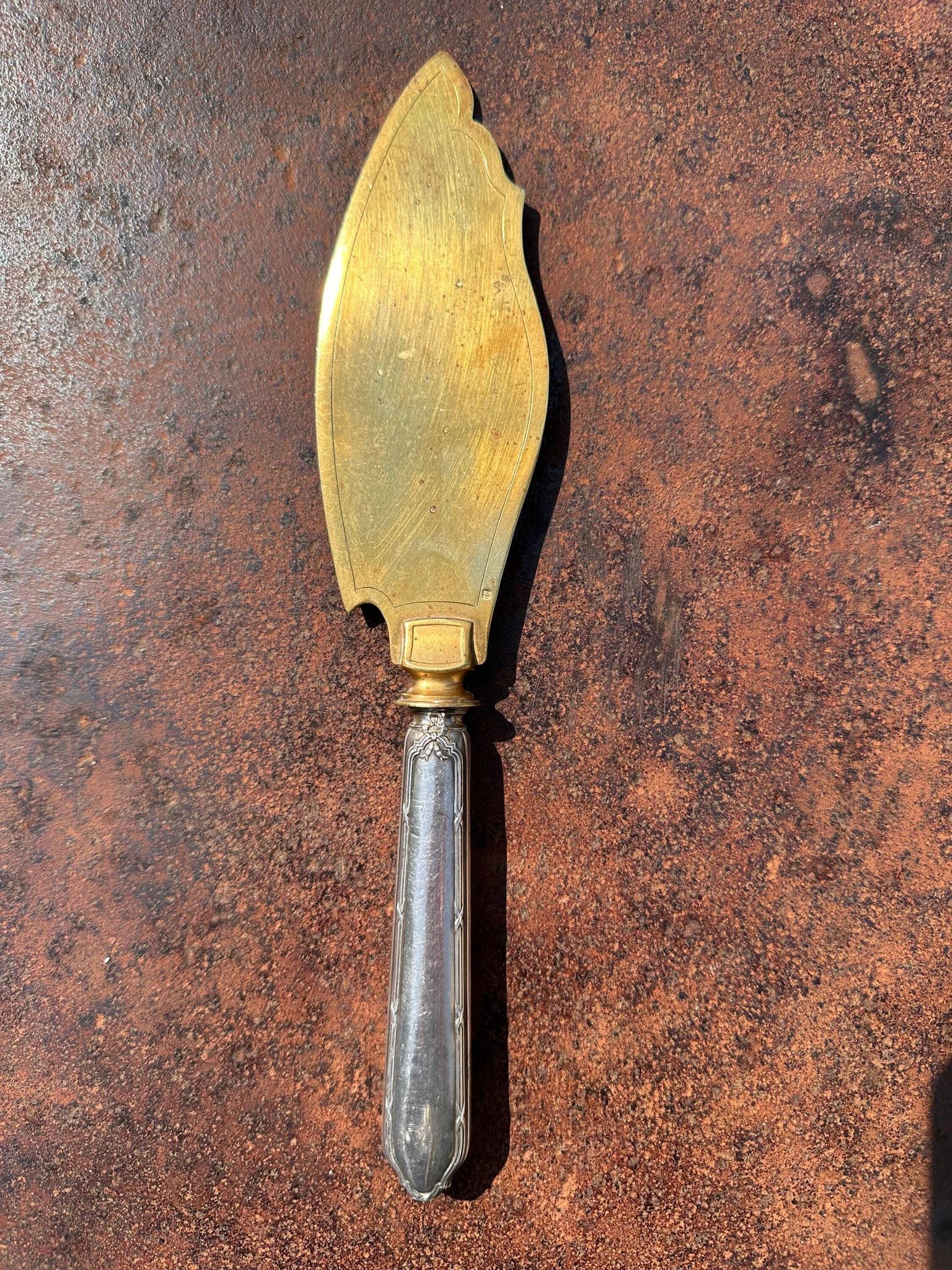 Silver-handled pie server Minerve, golden blade, Louis style.