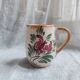 Small hand-painted pitcher