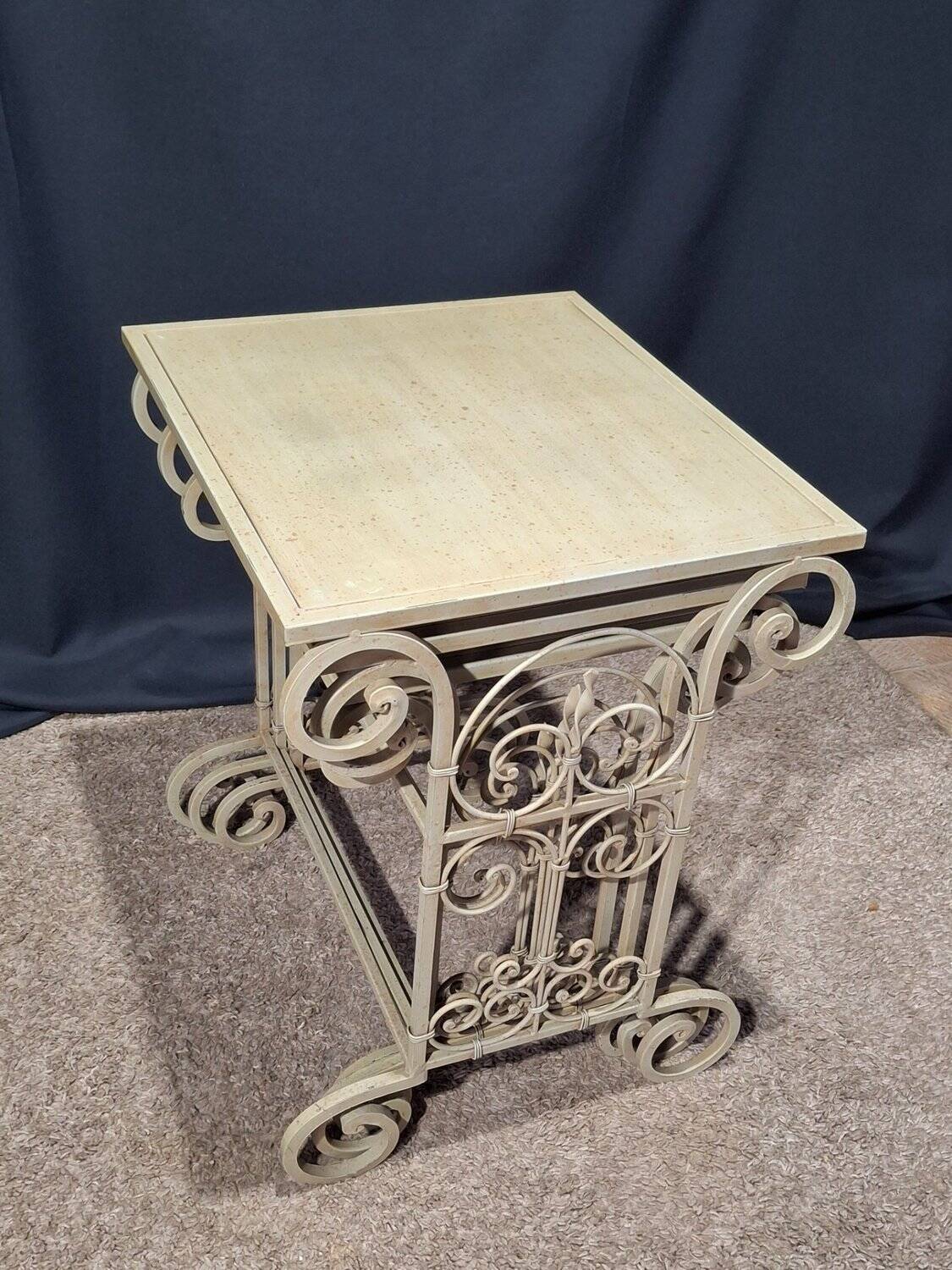 Nesting tables in patinated iron.