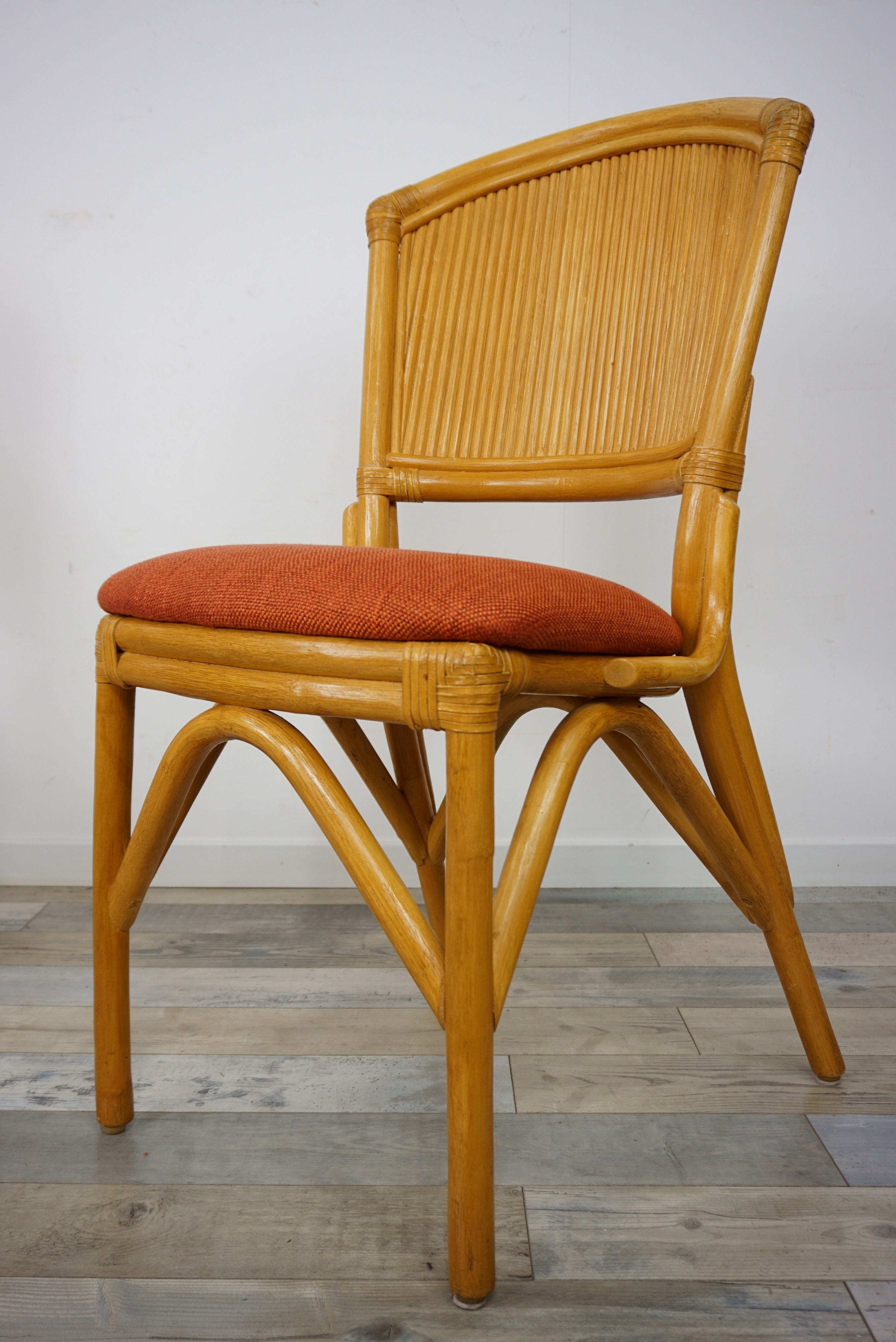 Suite of 4 chairs in Italian rattan design from the 60/70