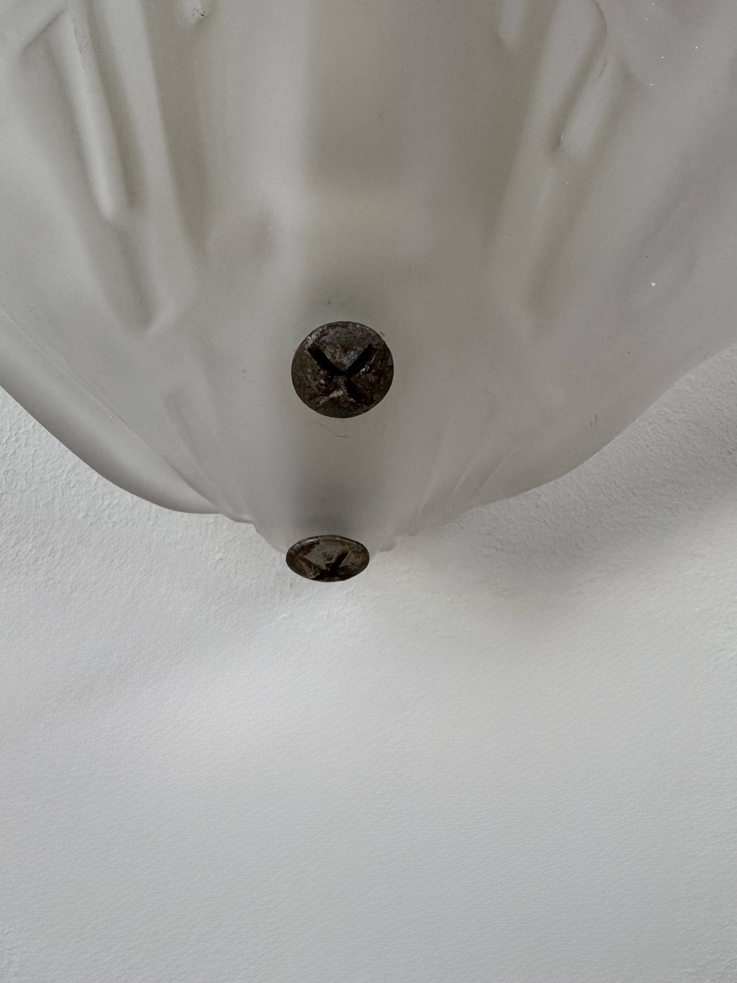 Pair of shell wall lights, frosted glass, France, 1970.