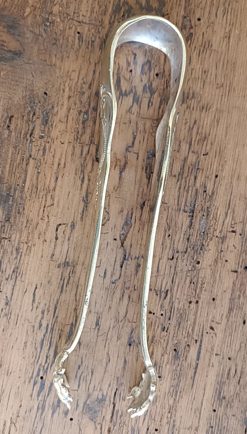 Silver-plated metal lion's paw sugar tongs