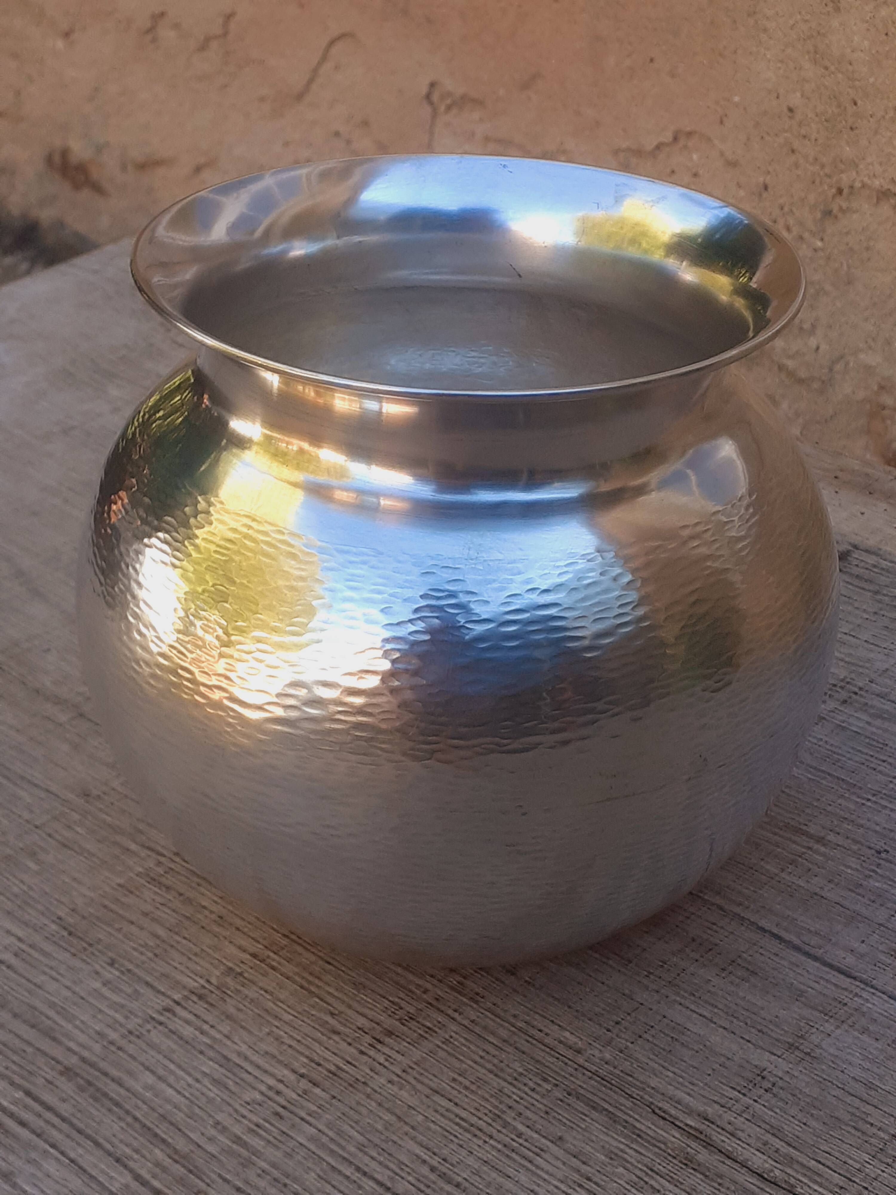 Vase boule style Art Déco en argent massif martelé
